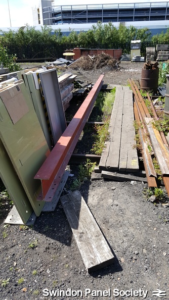 Before long, the front girder of the framework is dragged outside, ready for its next use.