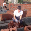 Tim sorting bricks